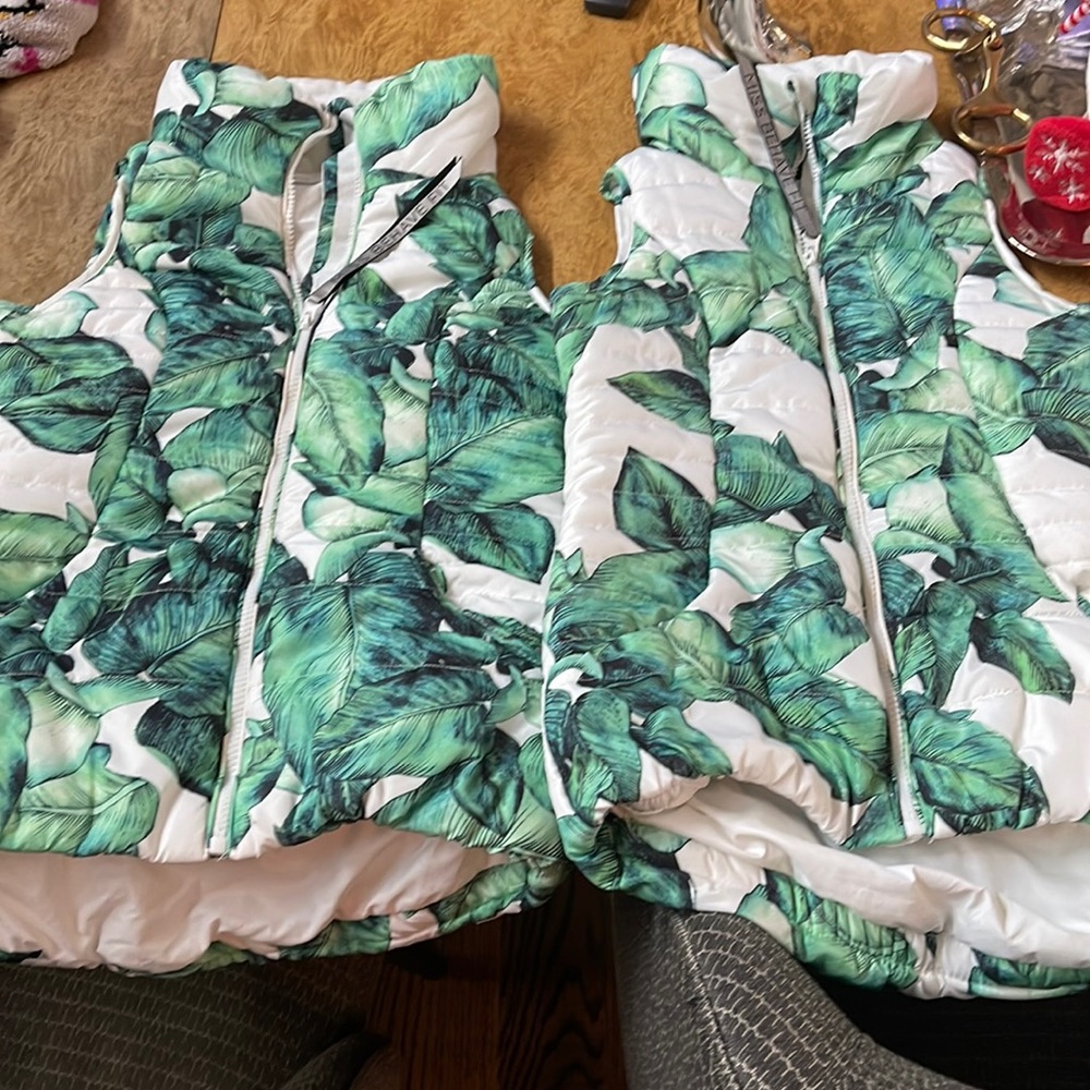 Two Miss Behave Fit synthetic zip up vests